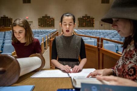 Batya Sperling Milner practicing for her Bat Mitzvah
