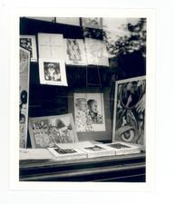 black and white photograph of the window display of a bookstore