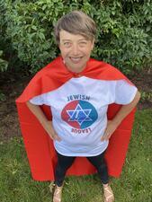 Idit Klein wearing superhero cape