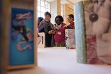 Artful Disclosure Facilitators' Workshop Participants with artwork