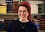 Rabbanit Leah Sarna wearing head covering, navy blue shirt, heart necklace