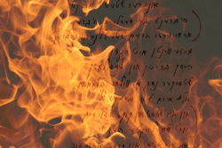 Mordechai Gebirtig's 'Undzer Shtetl Brent' with flames