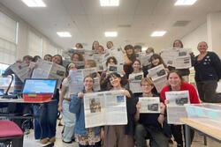 Franklin Post staff on distribution day of Issue 3. Naomi Granek Brown and Easton Atlansky, authors of the Jewish students article, are in the front displaying the spread.