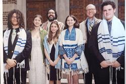 Venice Czarnecki-Lichstein and their confirmation class outside the steps of their shul