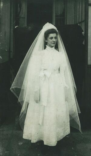 Tilde Vita wearing a white dress and veil