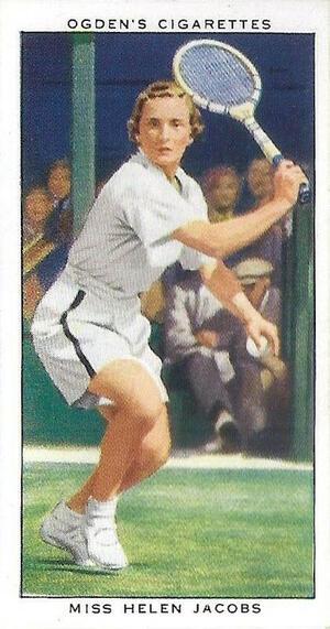 trading card with an image of a woman with short hair playing tennis in white tennis shorts, labeled "Ogden's Cigarettes" and "Miss Helen Jacobs"