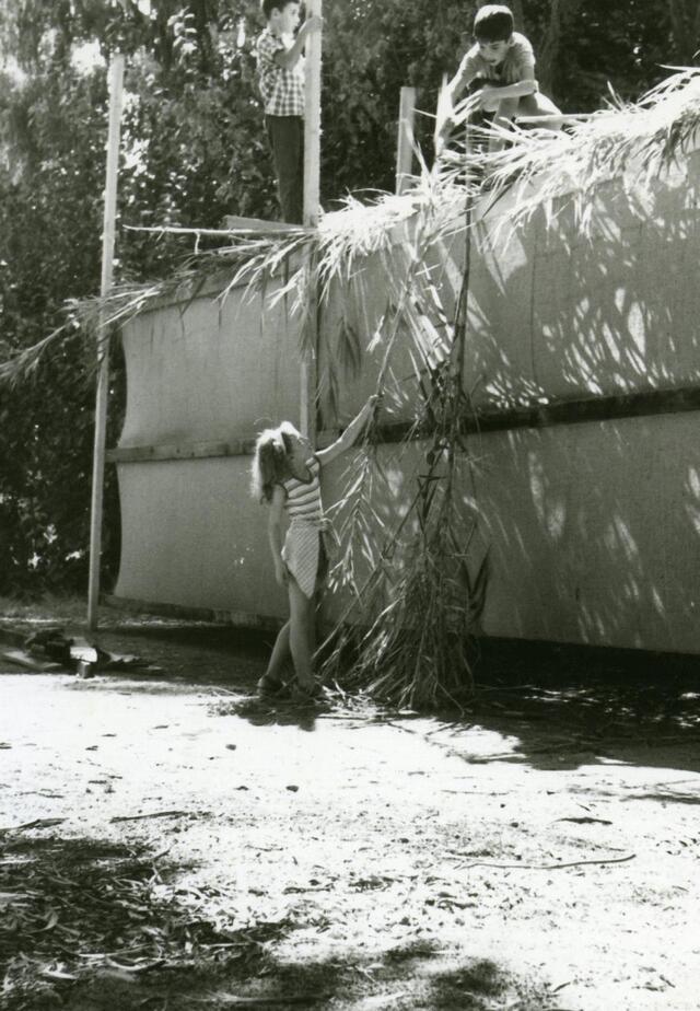 Kibbutz Dan, building a sukkah, 1930s.