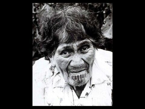 A woman with a traditional Maori moko tattoo on her chin