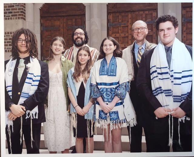 Venice Czarnecki-Lichstein and their confirmation class outside the steps of their shul