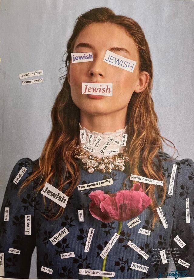 A woman with a calm expression wears labels reading "Jewish" on her face and blue dress. The dress features a large pink flower, intricate detailing, and conveys themes of identity.